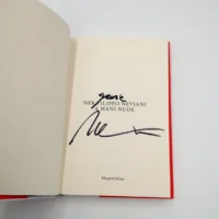 Libro A mani nude autografato da Nek (Filippo Neviani)