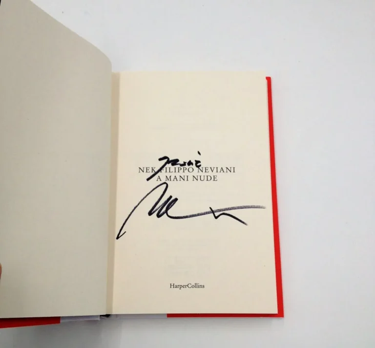 Libro A mani nude autografato da Nek (Filippo Neviani)